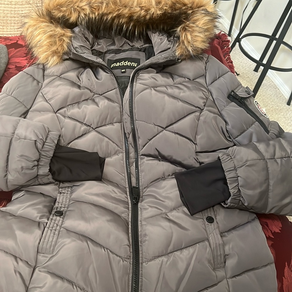 Brand new never worn woman’s Steve Madden coat with faux fur removable hood